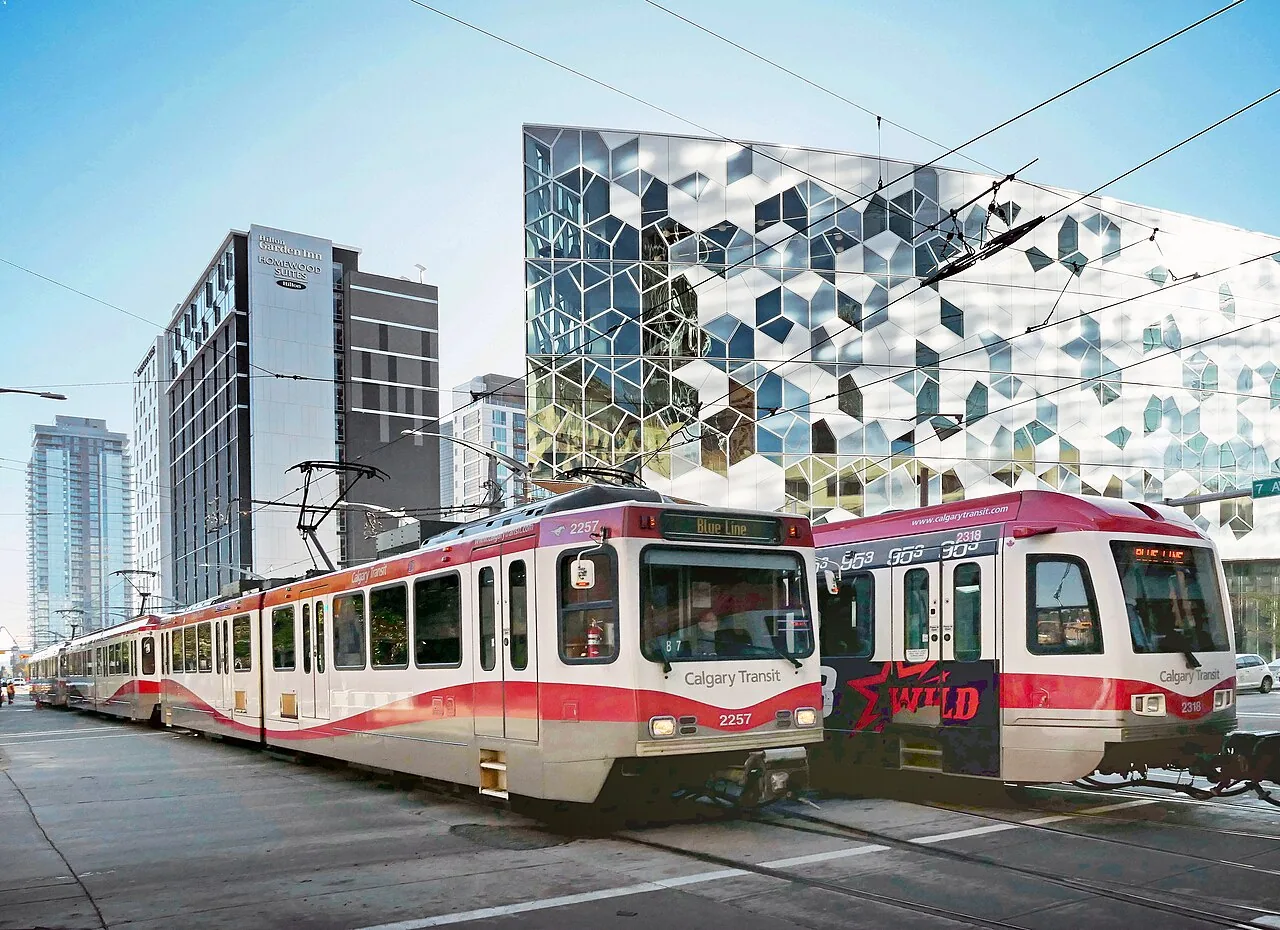 A Calgary light rail train beside an urban platform.